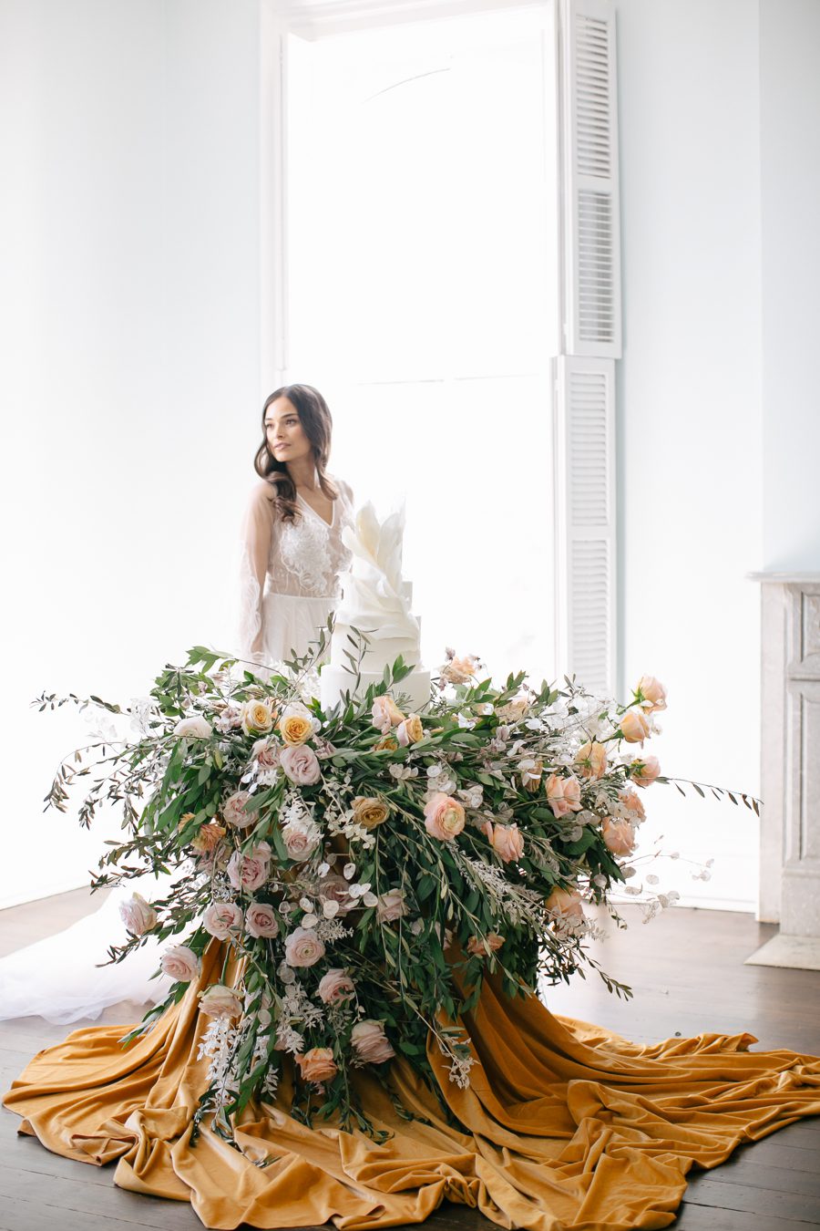 wisconsin bride magazine editorial wedding cake, carly mccray photography, lake geneva wedding photographers, private estate lake geneva wedding, modern wedding cake, lush wedding cake table florals, the covenant at murray mansion wedding