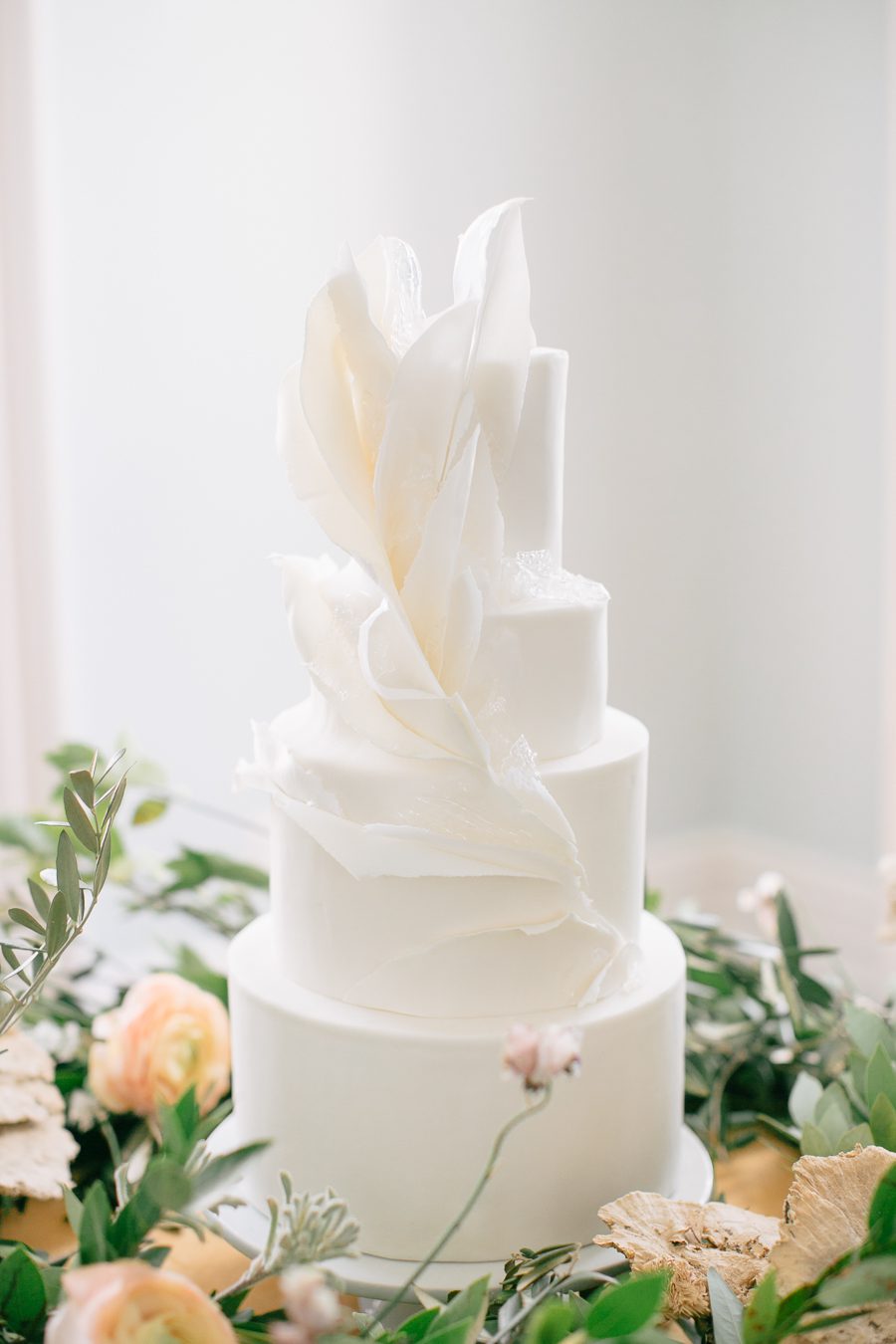 wisconsin bride magazine editorial wedding cake, carly mccray photography, lake geneva wedding photographers, private estate lake geneva wedding, modern wedding cake, lush wedding cake table florals, the covenant at murray mansion wedding
