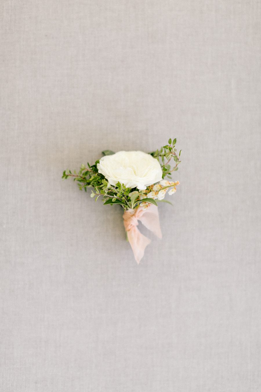 boutonnieres, wisconsin bride fine art door county wedding photographers, lake geneva wedding photos, bridal cape and hat, modern bride photography, wisconsin bride magazine cover carly mccray