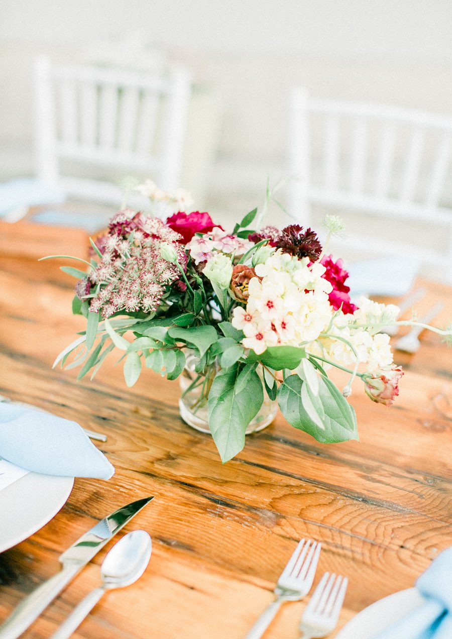 MMoCA Madison Wedding Photographers Cherry Blossom Events Carly McCray, black and white bride, wedding photos, daffodil parker, bridal bouquet, modern bouquet, custom wedding signage hand lettering, farm tables