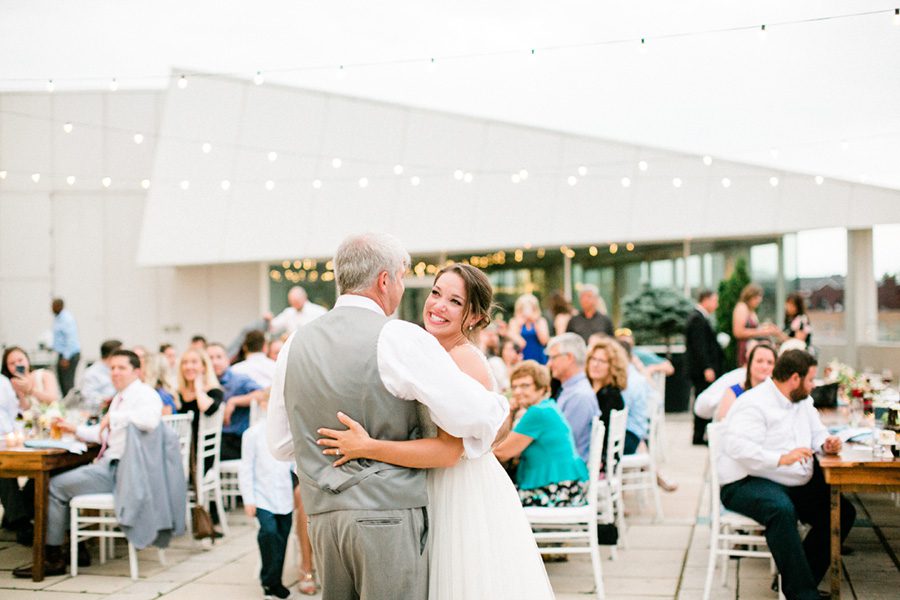 MMoCA Madison Wedding Photographers Cherry Blossom Events Carly McCray, black and white bride, wedding photos, daffodil parker, bridal bouquet, modern bouquet, custom wedding signage hand lettering, farm tables